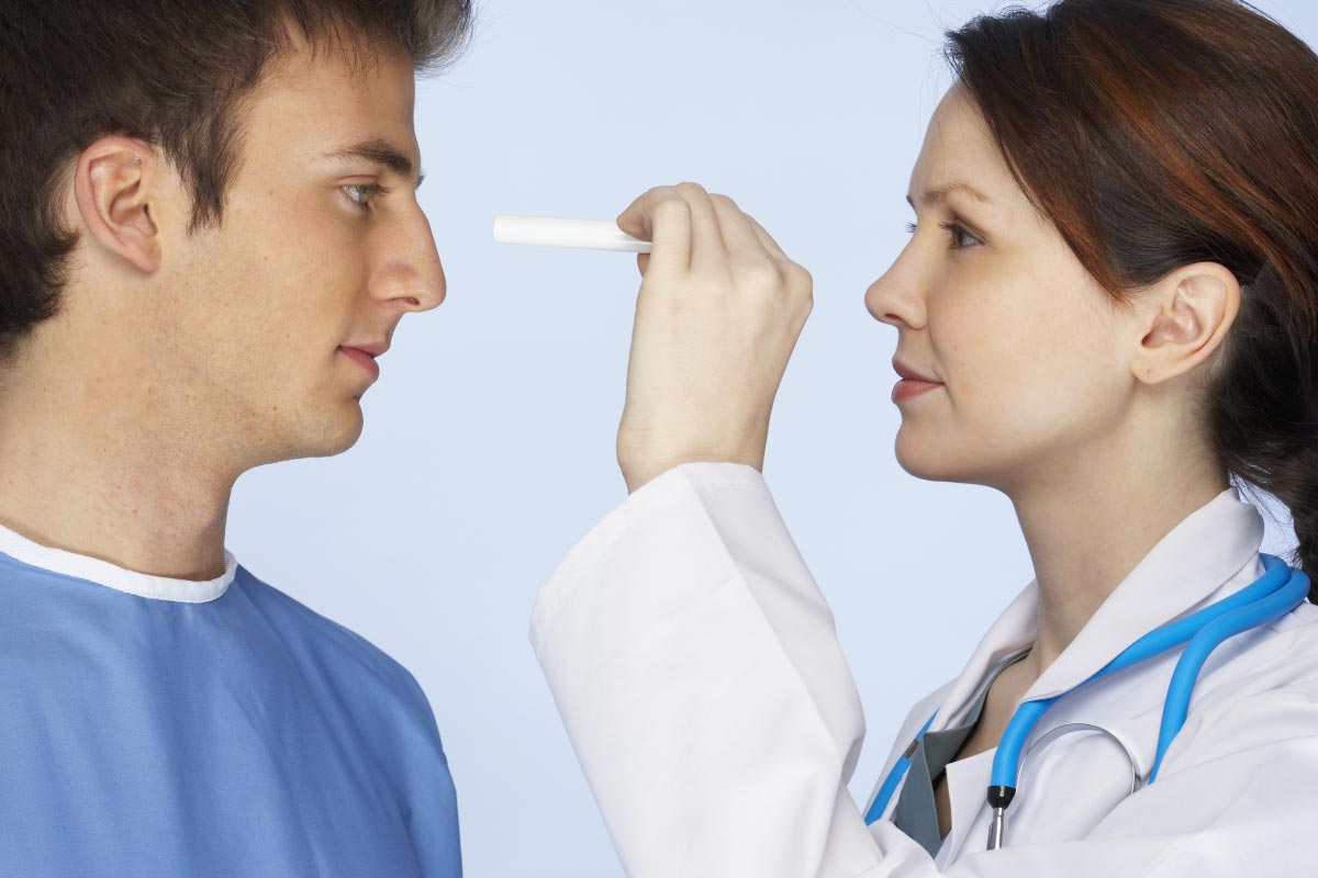 Woman-Doctor-Eye-Exam-Patient